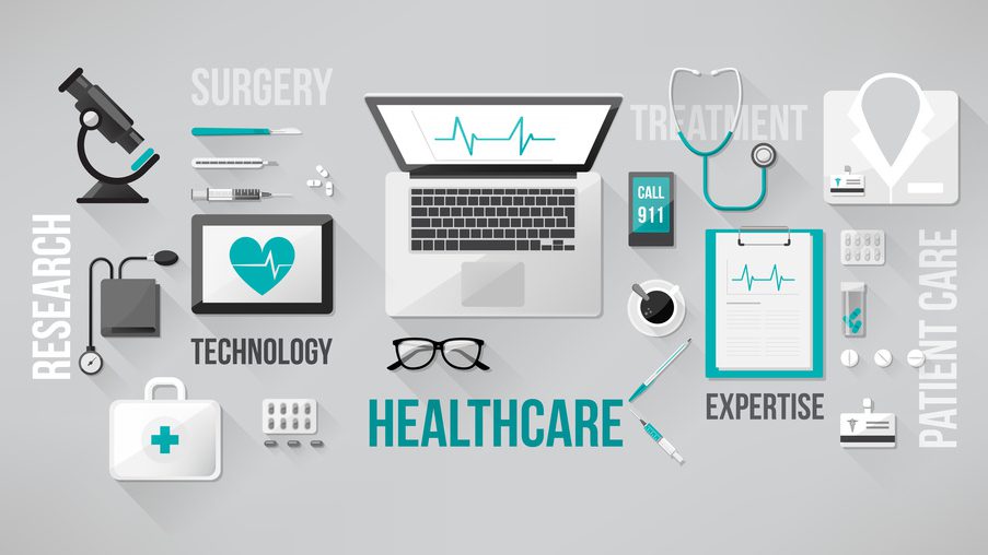 Doctor’s desktop with medical healthcare tools and equipment, laptop, tablet and phone
